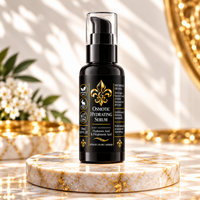 A black pump bottle of Osmotic Hydrating Serum with gold lettering and a fleur-de-lis logo, displayed on a round white marble pedestal with gold veining. The background is a warm, softly lit white wall with decorative gold accents and shadows.